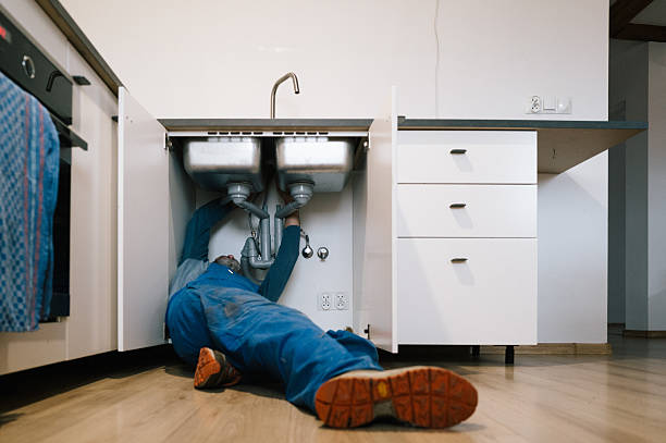 Professional Drain Cleaning technician working in Osseo, WI